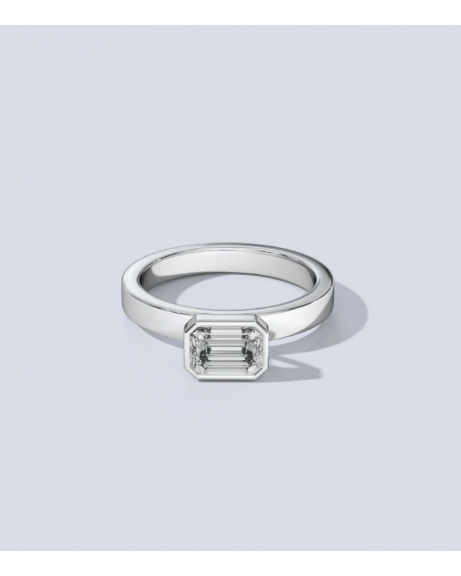 Бриллиант огранки "октагон" 5,6 x 4 мм. Белое золото.